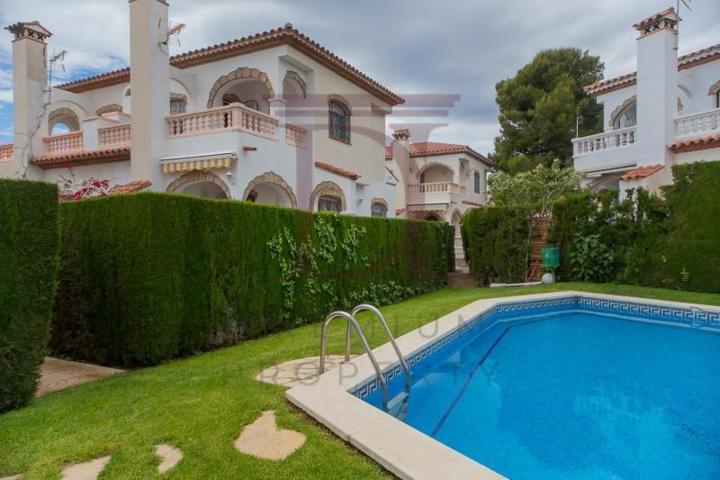 Adosada en venta en Miami Platja, Pino Alto photo 0