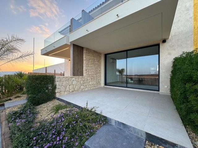 Adosada en venta en Cuevas del Almanzora, 1 DESERT SPRINGS RESORT photo 0