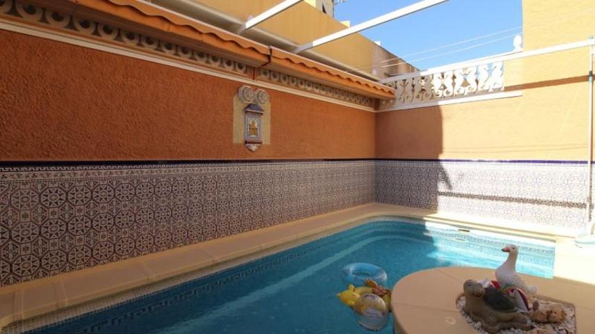 Adosada en venta en Roquetas de Mar, Avd. Carlos III photo 0