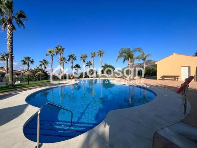 Adosada en venta en Coín photo 0