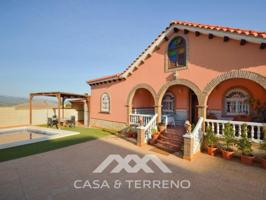 Local comercial en venta en Viñuela photo 0