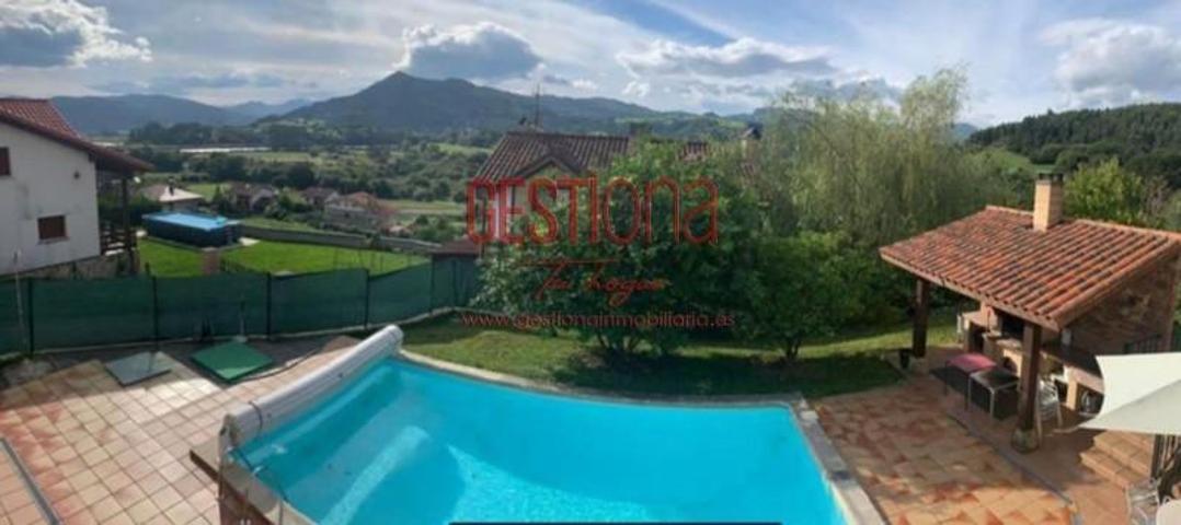 Adosada en venta en Bárcena de Cicero, Treto photo 0