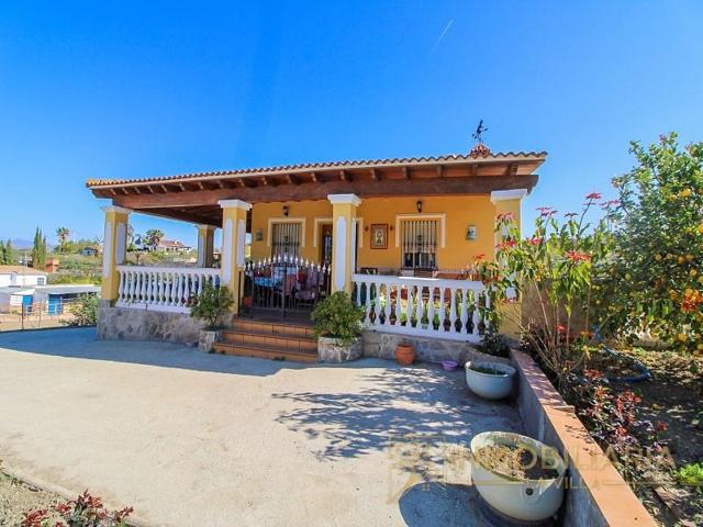 Casa con terreno en venta en Coín photo 0