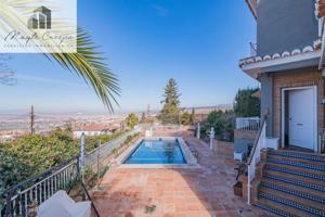 Chalet en venta en Monachil, Barrio de monachil photo 0