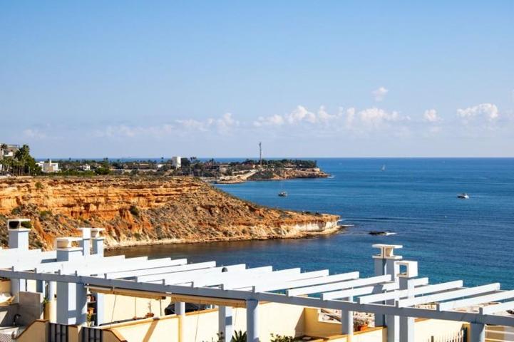 Adosada en venta en Dehesa de campoamor, Campoamor photo 0