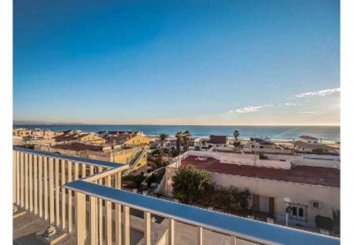 Adosada en venta en Guardamar del Segura, Playa photo 0