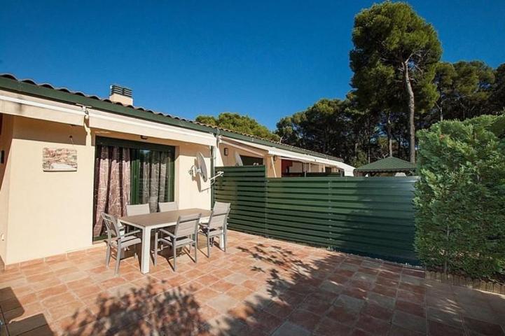 Adosada en venta en Lloret de Mar, Fenals photo 0