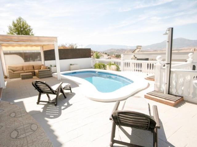 Chalet en venta en Coín photo 0