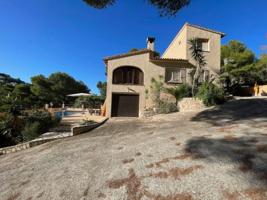 Chalet en venta en Moraira, El Portet photo 0