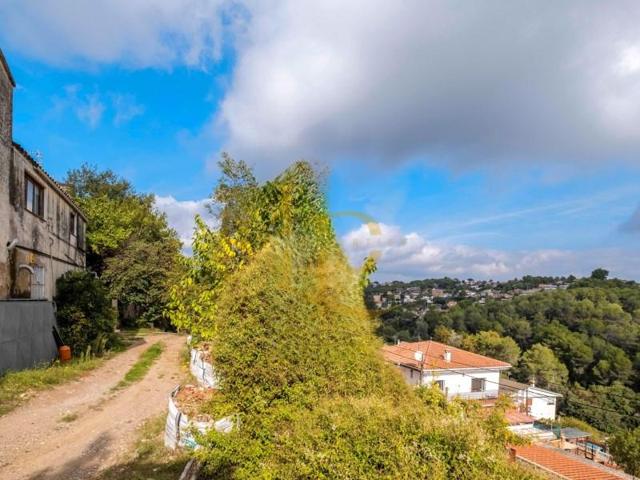 Casa con terreno en venta en Rubí photo 0