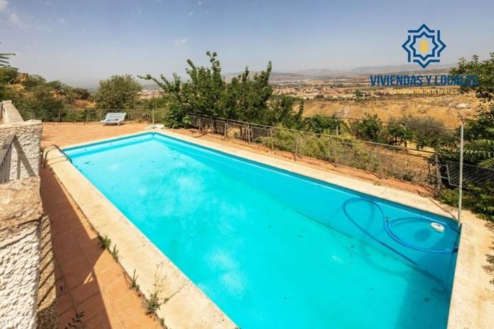 Casa con terreno en venta en Granada, El fargue photo 0