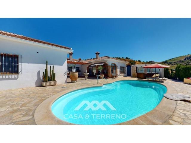 Chalet en venta en Iznate photo 0