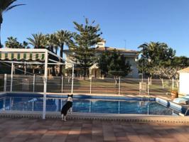 Chalet en venta en Cabo Roig, La Zenia photo 0