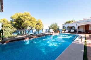 Chalet en venta en Denia, Las rotas photo 0