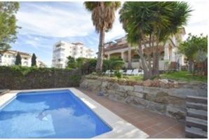 Adosada en venta en Marbella photo 0