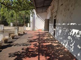 Casa con terreno en venta en Alcira, A las afueras photo 0