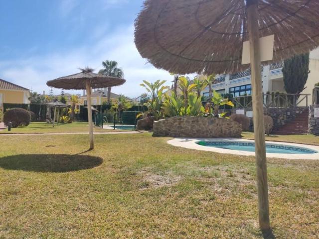 Adosada en alquiler en Lepe, Islantilla - Campo de Golf photo 0