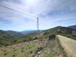 Terreno en venta en Moclinejo photo 0