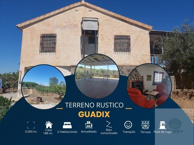 Casa con terreno en venta en Guadix photo 0