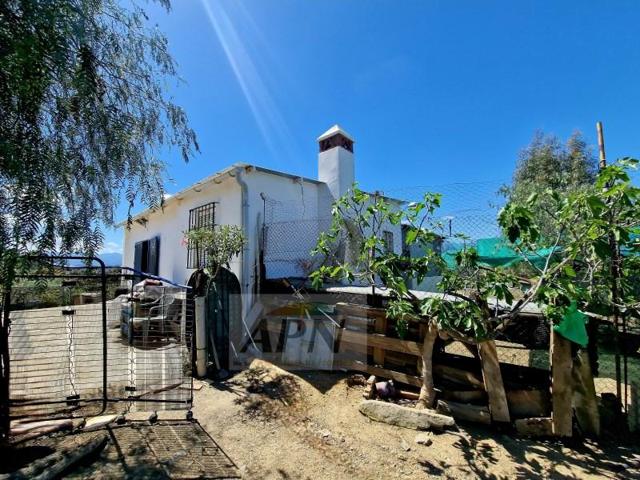 Casa con terreno en venta en Coín photo 0
