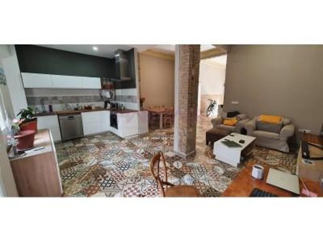 Planta baja en venta en Valencia, En Corts photo 0