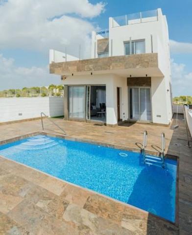 Chalet en venta en Orihuela Costa, Villamartin photo 0