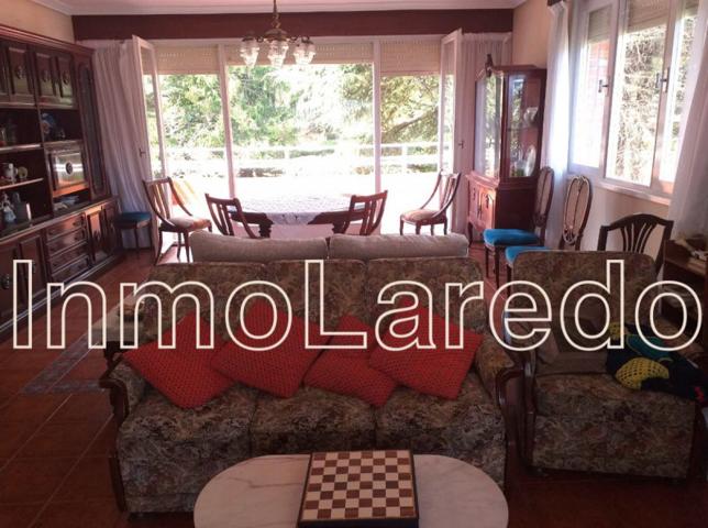 Chalet en venta en Laredo, Playa photo 0