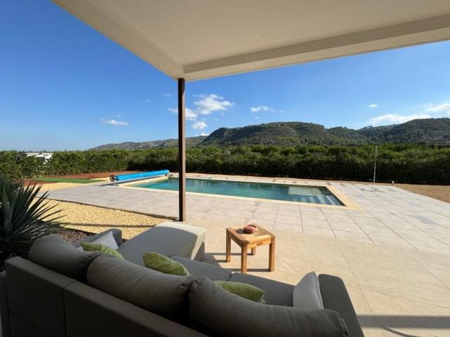 Chalet en venta en Beniarbeig photo 0