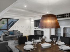 Aticos en venta en Naut Aran photo 0