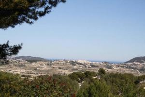 Parcela en venta en Moraira, Benimeit photo 0