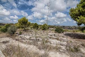 Parcela en venta en Moraira, Benimeit photo 0