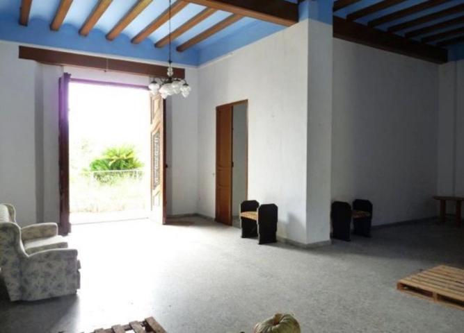 Casa con terreno en venta en Benifairó de la Valldigna, A las afueras photo 0