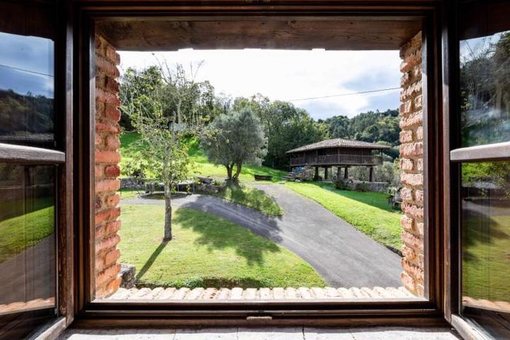 Casa con terreno en venta en Villaviciosa, Villaviciosa photo 0