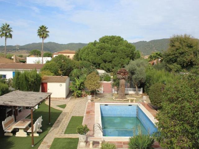 Casa con terreno en venta en Córdoba, El Higuerón photo 0