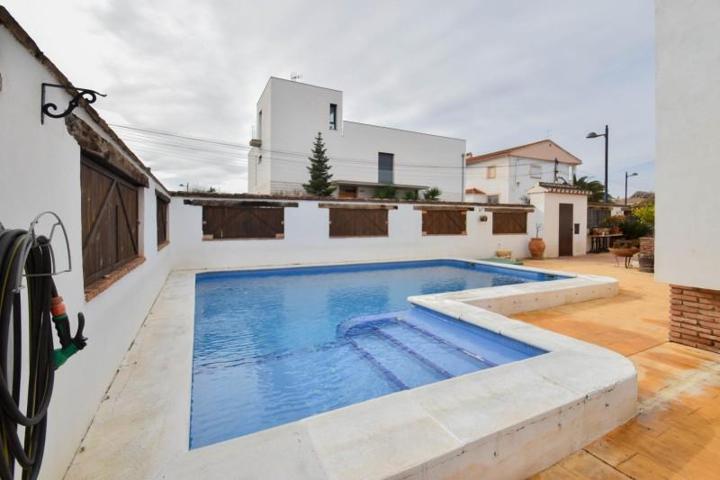 Chalet en venta en Cúllar Vega, El ventorrillo 1 photo 0