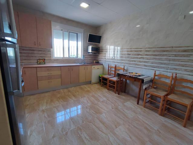 Bonita planta baja reformada en zona tranquila junto a la montaña photo 0