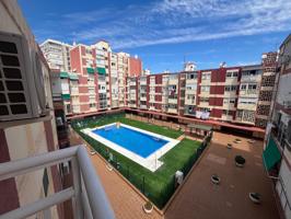 Amplio piso de 4 dormitorios, centro torremolinos con piscina photo 0