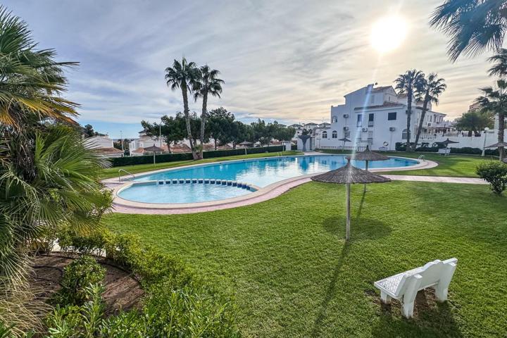 ACOGEDORA CASA ADOSADA CON DOS TERRAZAS Y PISCINA COMUNITARIA – LA MATA, TORREVIEJA photo 0
