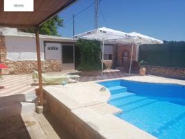 PARCELA CON VIVIENDA, PISCINA Y NAVES EN VILLALGORDO DEL JÚCAR photo 0