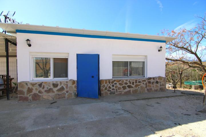PARCELA RURAL CON CASA, ALMACEN Y ALBERCA. photo 0