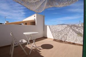 Bonita casa adosada reformada con encanto andaluz y terraza en el centro de Coín photo 0