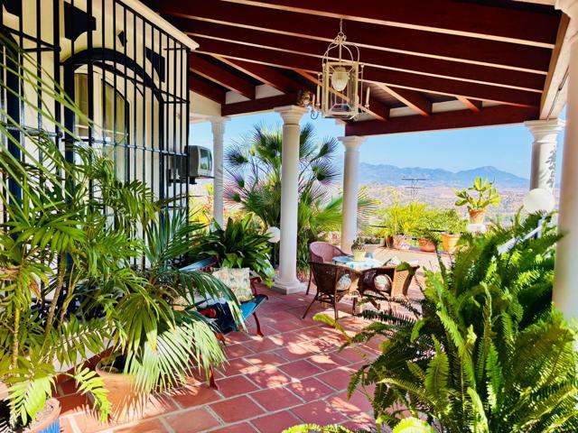 Encantadora casa en venta en Coín – ¡Una joya única con espectaculares vistas! photo 0