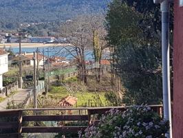 CASA RUSTICA ADOSADA CON JARDIN Y VISTAS AL MAR photo 0