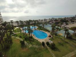 Piso renovado completamente en primera línea de mar en urbanización de lujo en Playa Muchavista de Alicante photo 0