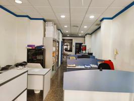 GRAN ALMACEN Y OFICINAS EN POBLACION photo 0