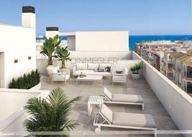 Exclusivo atico con solarium privado de 45 m2 a 300 metros de la playa. Torrevieja photo 0