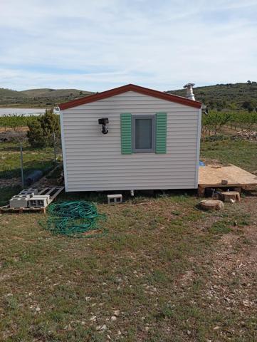 CASITA PREFABRICADA CON PARCELA photo 0