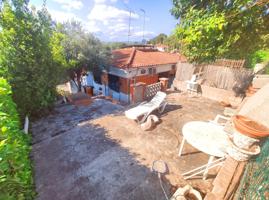 Casa adosada en venta con parcela de 350 m², garaje y terraza photo 0