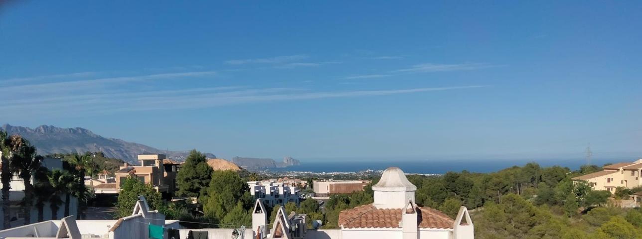 SE VENDE ADOSADO DE DOS DORMITORIOS EN LA NUCIA CON VISTAS AL MAR photo 0