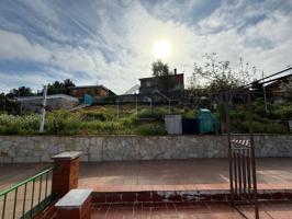 TERRENO DE 775 CON UNA CONSTRUCCIÓN EN UN GARAJE DE 40 M2 HABILITADO COMO VIVIENDA photo 0